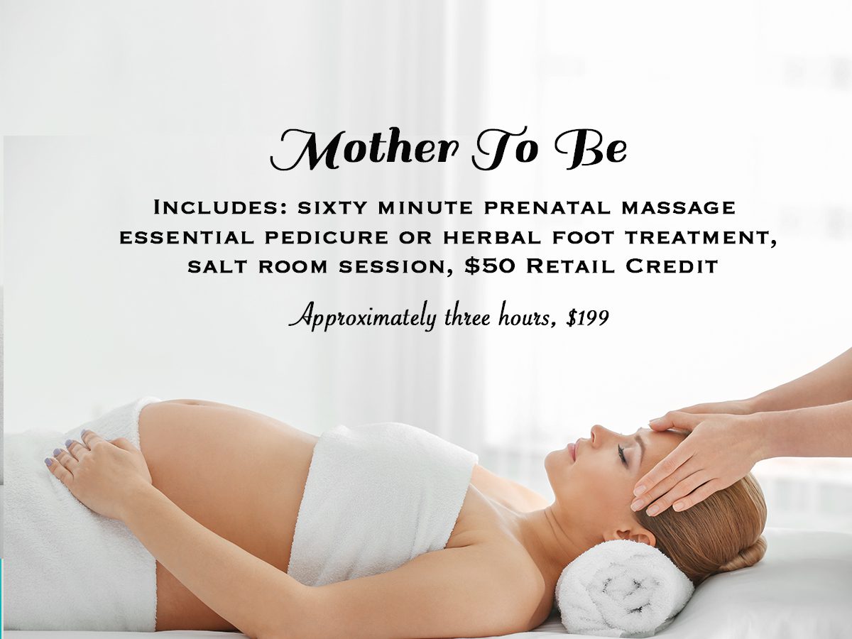 A woman getting her head and hands massaged