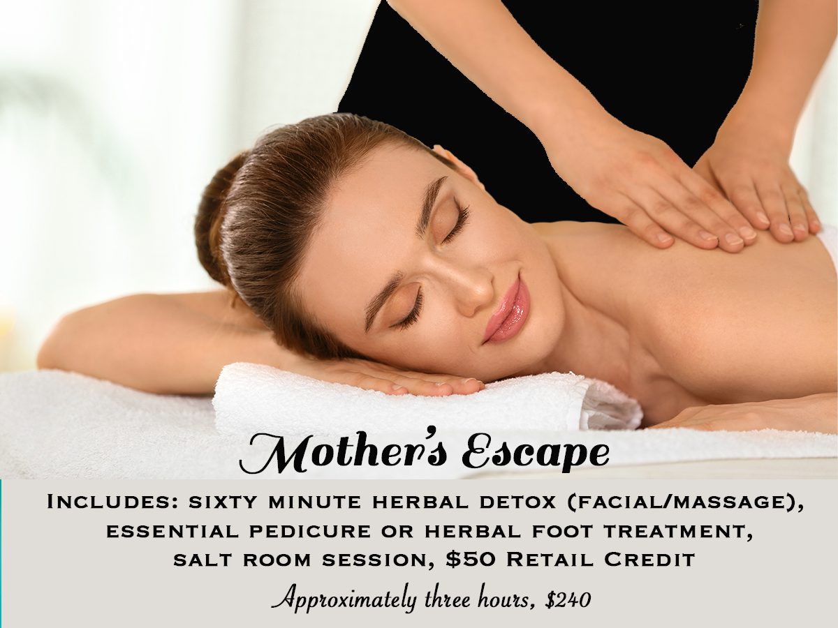 A woman getting a massage from a masseuse.